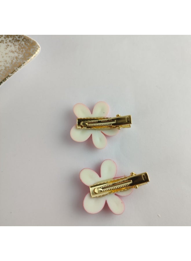 عرض 2 توكة شعر كلبس شكل وردة أنيقة – تصميم رقيق وثبات مريح - Image 4